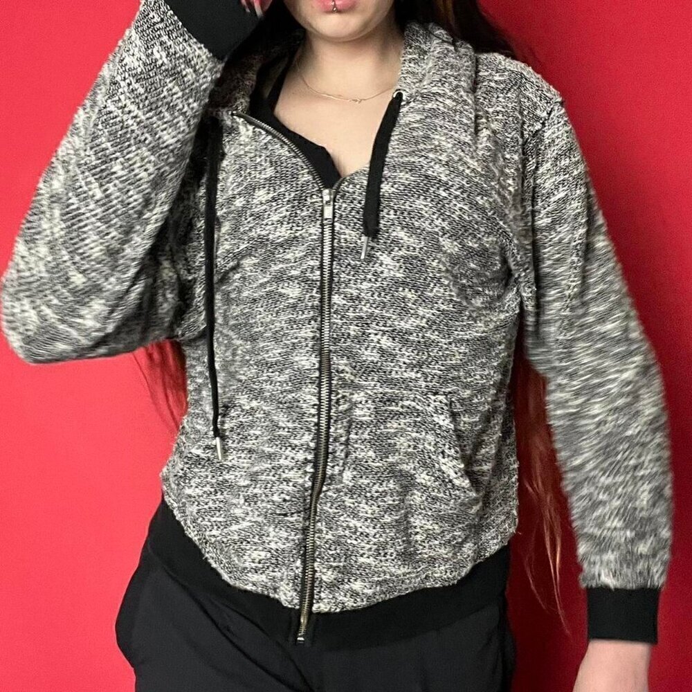 Light grey hooded sweater with black trim